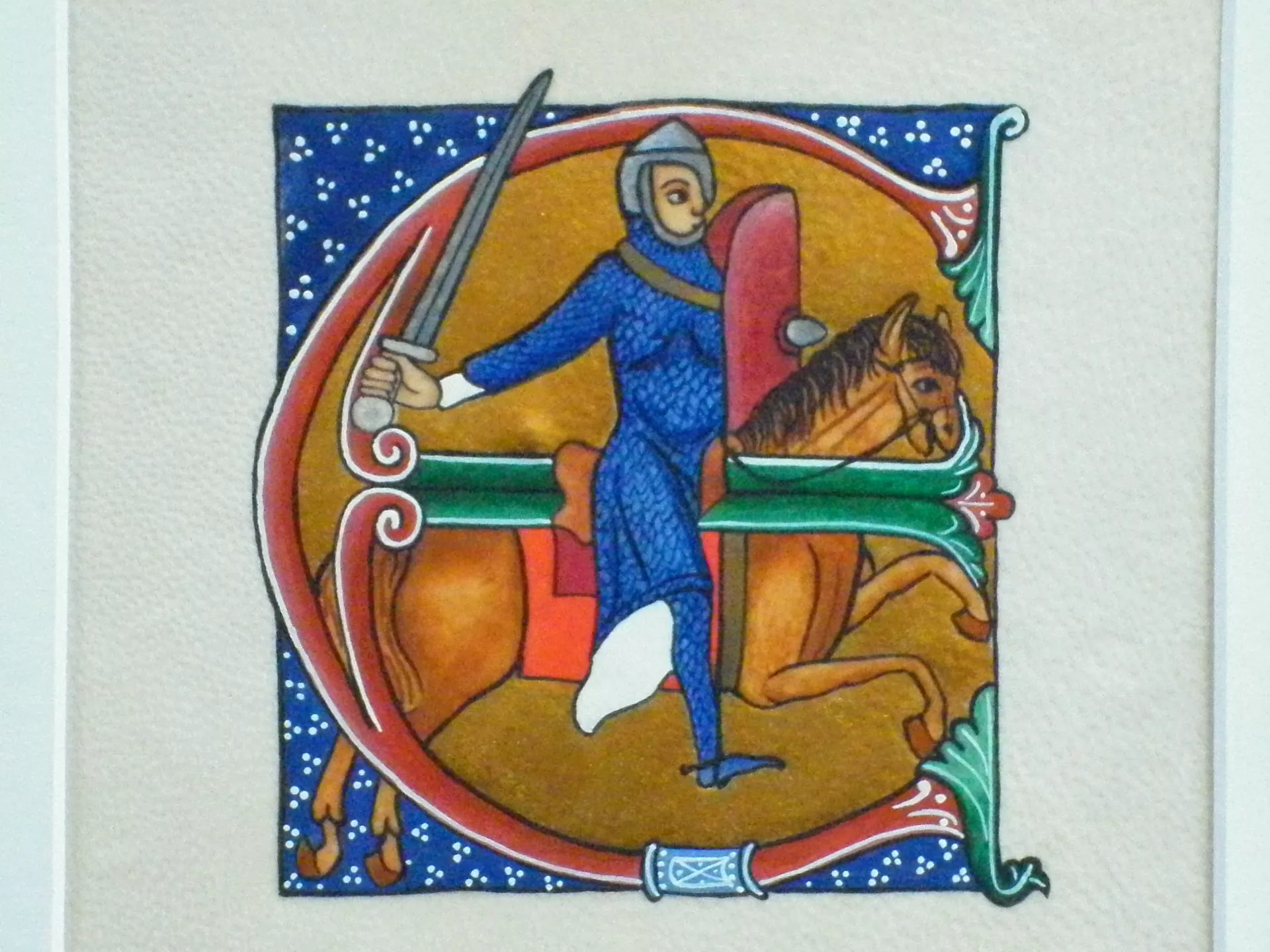 Lettrine enluminée sur parchemin, pigments naturels et feuille d'or 23.5 carats