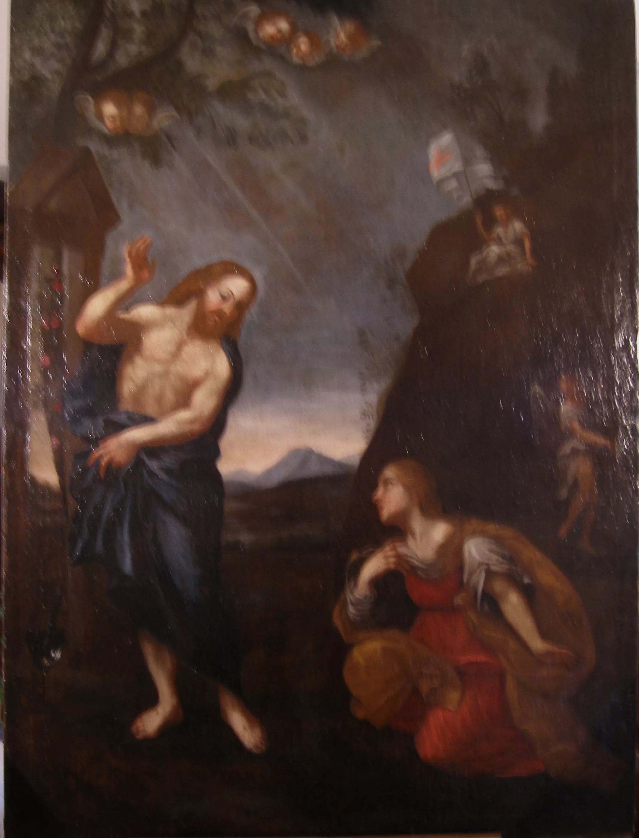 Restauration d'un tableau représentant la rencontre du Christ et de Marie-Madeleine