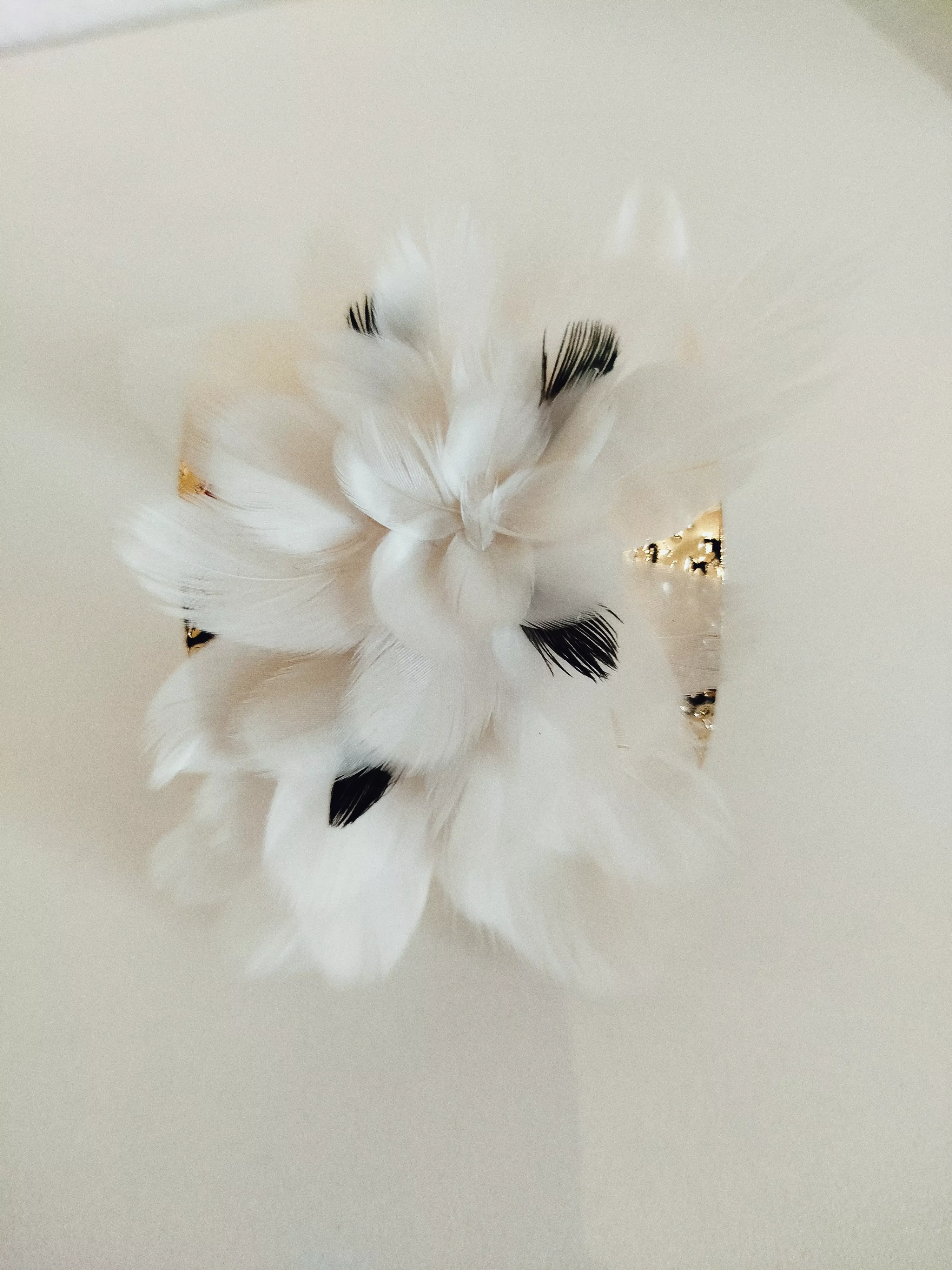 Manchette, plumes naturelles de canard 