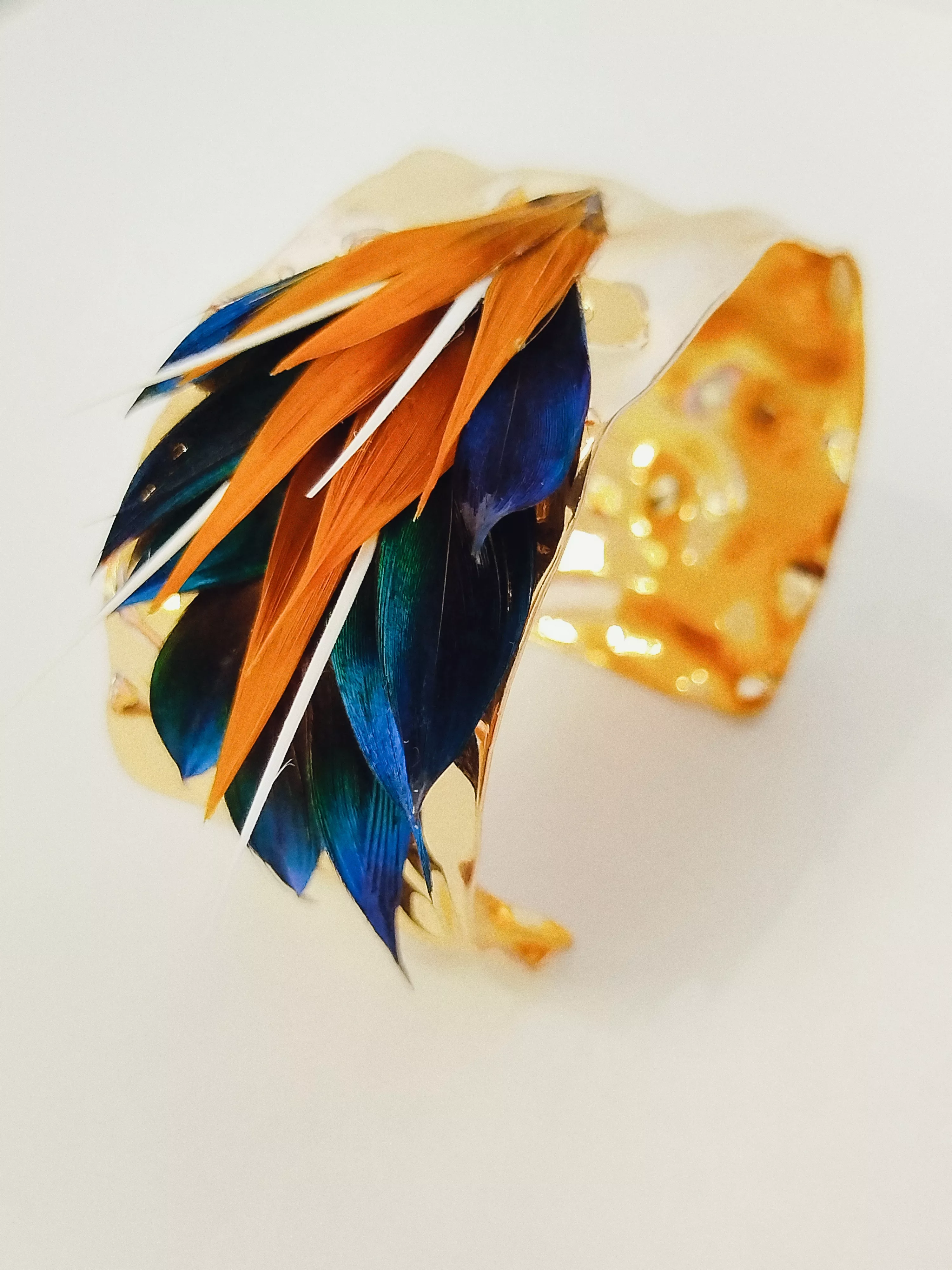 Manchette, pétales de plumes 