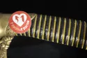 Filigrane surlié en laiton doré sur une fusée de sabre modèle 1821